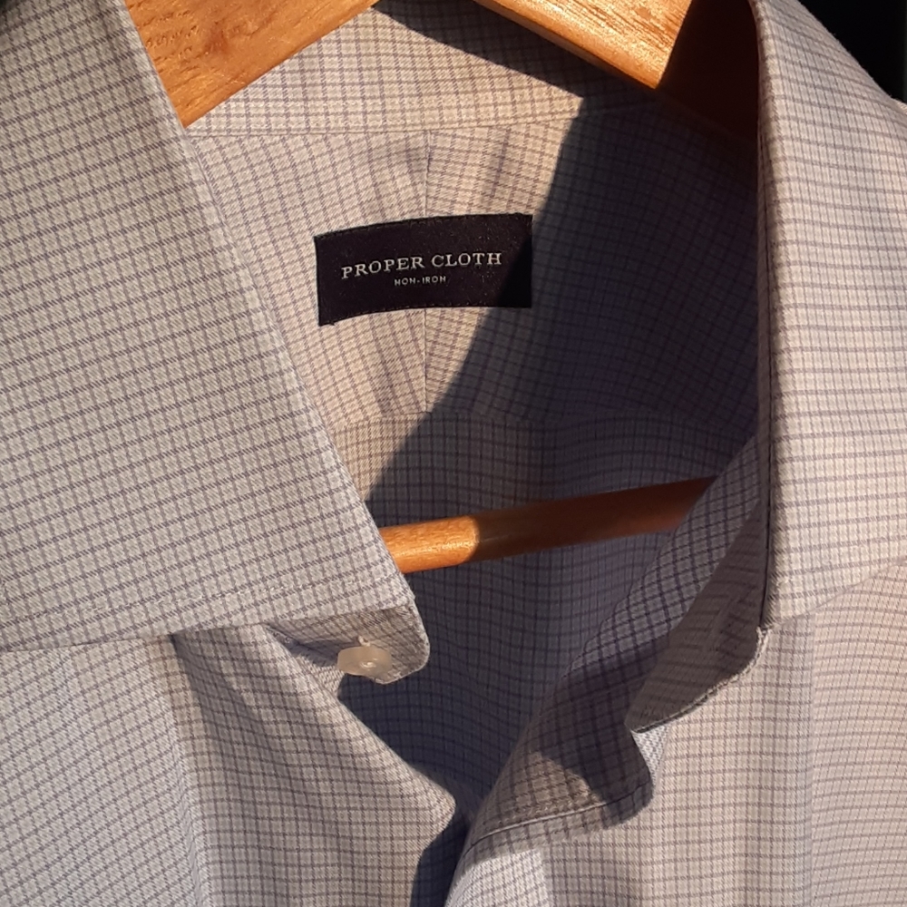 Mens dress shirt. Light blue. Mini square pattern.